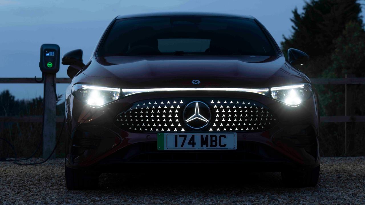 2025 Mercedes CLA front end illuminated at night