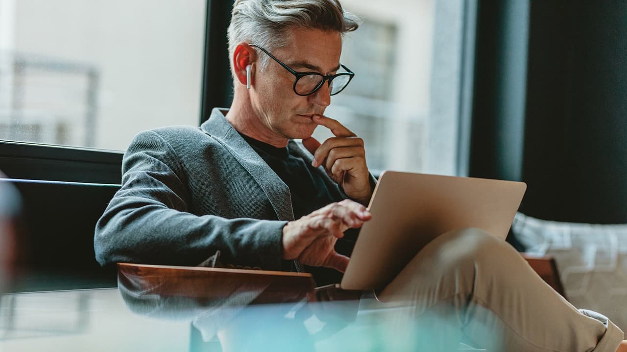Person staring at laptop screen