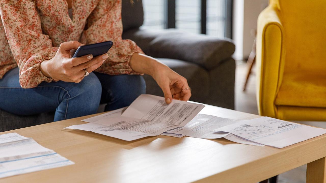 Shopper checking documents