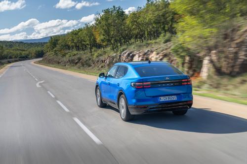 2025 Ford Capri blue rear driving
