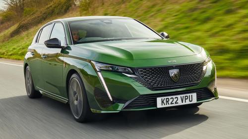 Peugeot 308 driving, green