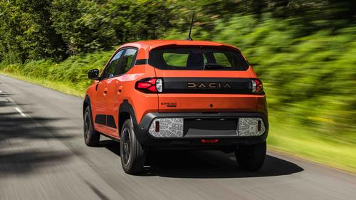 Dacia Spring driving rear view